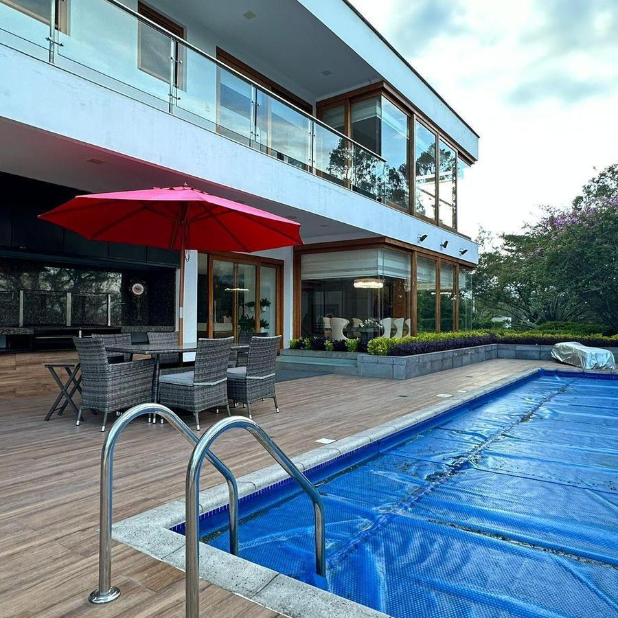 Casa con 4170 m² en Venta con 5 Habitaciones en Tumbaco — imagen 9