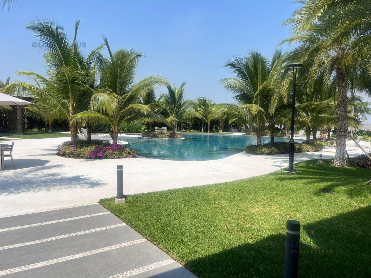 Venta de Casa en Pta Barranca con 4 Hab. c/u con Walk in Closet y Baño Privado - Garaje Cubierto. m. C, Guayas — imagen 2